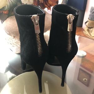 Zara black suede booties with gold zipper.